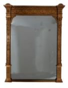 A Victorian giltwood and composition framed overmantel mirror in Neoclassical style,