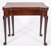 A George II mahogany combined tea and card table,