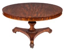A mahogany circular breakfast table in Regency style,