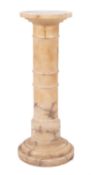 An Italian alabaster pedestal, circa 1900.