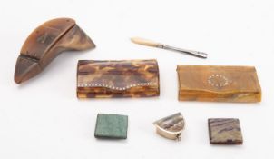 A collection of snuff boxes, comprising horn and celluloid examples,