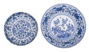 A Chinese blue and white moulded saucer dish and a similar bowl,