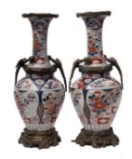 A pair of Japanese gilt-metal mounted Imari vases,