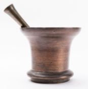 An English turned bronze mortar, late 17th /early 18th century; of cylindrical form,
