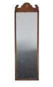 A parcel gilt walnut framed rectangular pier mirror in George II taste,