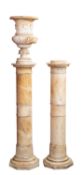 A pair of Italian alabaster pedestals, one with Campana urn top,