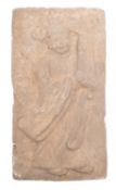 A Chinese stoneware tomb brick modelled in high relief with flute player, 38cm tall, Jin dynasty.