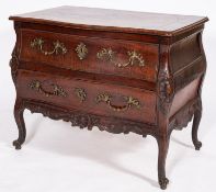 A Louis XV bow fronted walnut bombe commode,