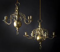A matched pair of Dutch brass six light chandeliers, in early 18th century style,
