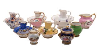 A group of English miniature and toy porcelains comprising five Derby and other jug and basin sets,