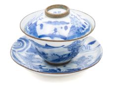 A Chinese 'Bleu de Hue' bowl, cover and stand, Qing dynasty/19th century of ogee form,