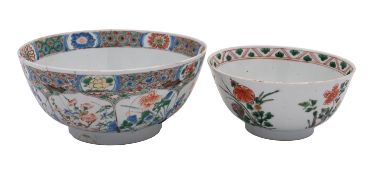 Two Chinese famille verte bowls, Kangxi painted with flowering shrubs and rockwork,
