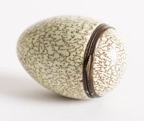 An enamelled box modelled as an egg, 19th century; with hinged cover,