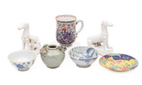 A mixed group of Chinese porcelain, comprising a pair of blanc de chine hounds, 16cm high,
