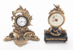A small black marble and gilt-metal mantel clock having an eight-day duration three-quarter plate