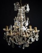 A gilt metal and cut glass hung six light chandelier, in 18th century style,