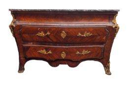 A Louis XV marble topped kingwood bombe commode,
