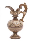 A Gerbing & Stephan majolica ewer with profuse incised decoration, impressed marks, 32cm high.