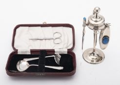 A silver plated Art Nouveau manicure set