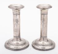 A pair of Edward VII silver dwarf candle