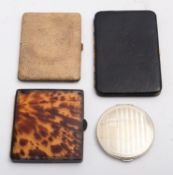 A mixed group of cigarette cases includi