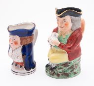 Two Staffordshire pottery toby jugs, 22