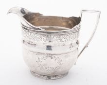 A George III silver cream jug, maker's m