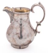 A mid 19th century silver plated cream j
