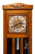 A mid-20th century chiming longcase cloc