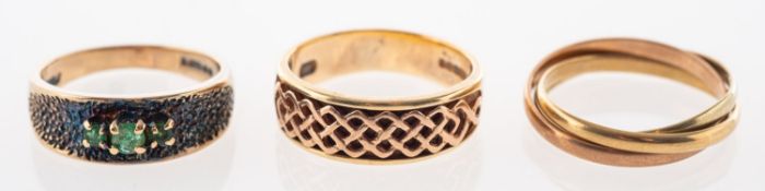 A group of three 9ct gold rings, includi