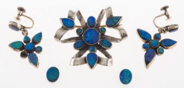 A small group of black opal doublet set