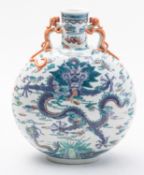 A Chinese porcelain dragon moon flask wi