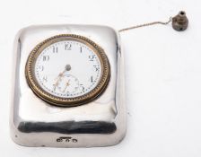 A Victorian silver clock paperweight by