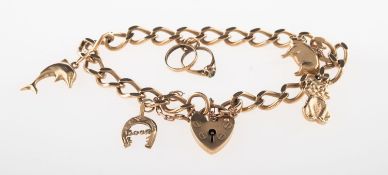 A 9ct gold charm bracelet, of curb links with heart padlock and safety chain,
