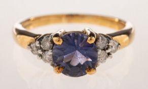 A 9ct gold purple stone and diamond ring,