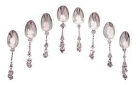 Eight 19th century Dutch silver spoons, with figural terminals,