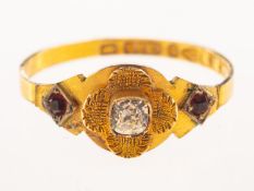 A Victorian ring, with a central raised textured finish flowerhead set to the centre