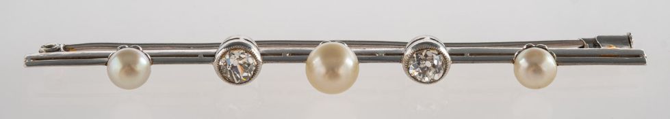 A diamond and pearl bar brooch, milgrain set with two old-cut diamonds, diamonds approx. 0.