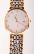 Omega De Ville bi-metallic wristwatch the round white dial having raised Arabic numerals,