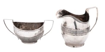 A silver milk jug & sugar basin,
