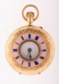 A small half-hunter 18K gold pocket watch the round white enamel dial having black Roman numerals