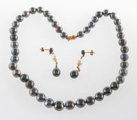 A Tahitian pearl necklace and a pair of cultured pearl drop earrings,