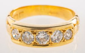 An antique 18ct gold five stone diamond ring,