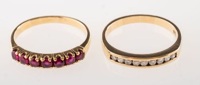 Two gem-set stacking rings, including a ring channel set with nine brilliant-cut diamonds,