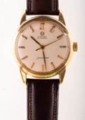 Omega Seamaster a gentleman's 18K gold wristwatch the round cream dial having raised gold and black