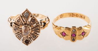 Two antique rings, including an openwork cluster style ring,