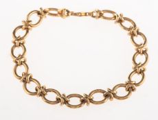 A 9ct gold fancy link bracelet, UK hallmark and Import mark for 375 to end and central links,