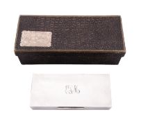 An Edwardian silver cigarette box, of rectangular form,