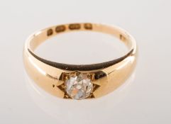 A late Victorian 18ct gold and diamond ring, star set with an old mine-cut diamond, diamond approx.