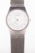 Skagen a gentleman's stainless steel wristwatch the silvered dial having baton numerals and hands,